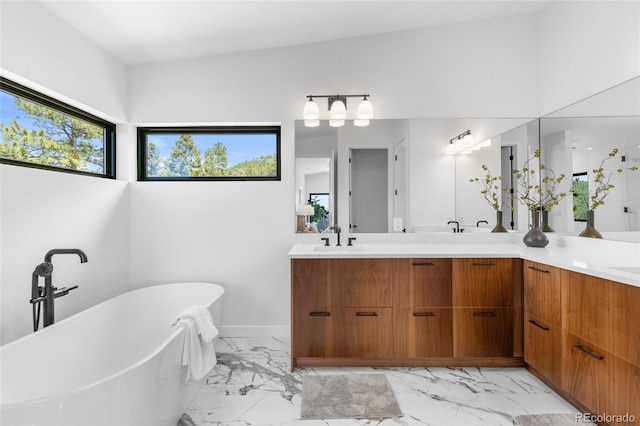 13415 S Resort Dr, Conifer, CO 80433 - full bath with marble look tiles, double vanity, and a freestanding tub