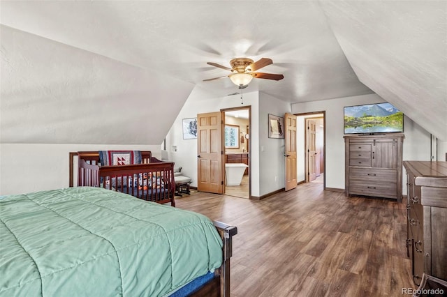 bedroom featuring vaulted ceiling, a textured ceiling, baseboards, and dark wood-style flooring