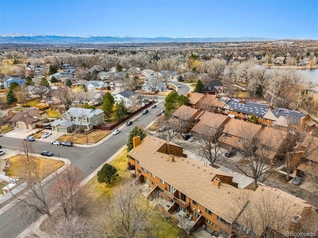 aerial view with a mountain view and a residential view