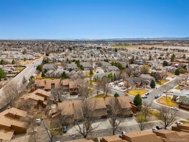 aerial view featuring a mountain view and a residential view