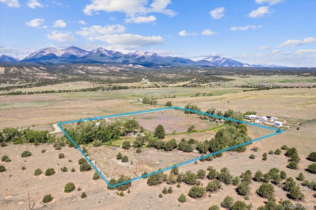 bird's eye view featuring a mountain view and a rural view