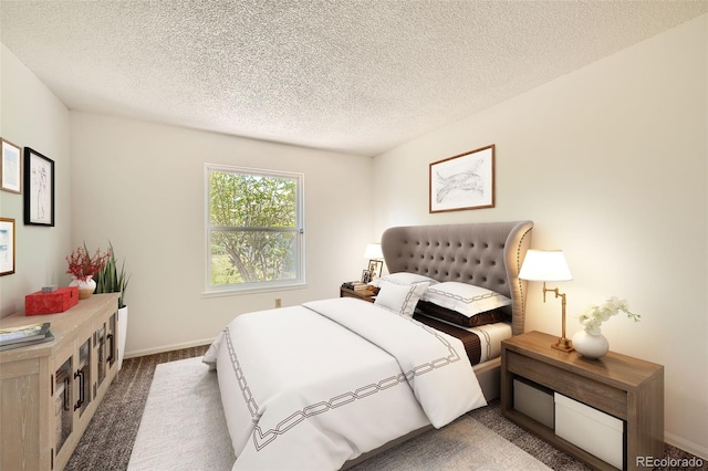 bedroom with a textured ceiling and carpet floors