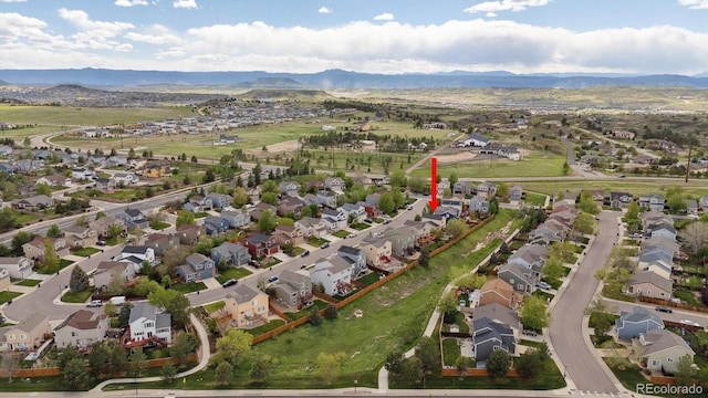 4915 Parsons Way, Castle Rock, CO 80104 - aerial overview of property's location featuring nearby suburban area and mountains