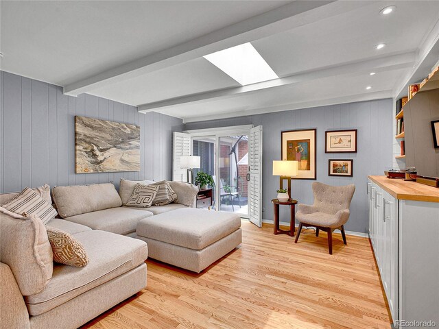 3481 S Race St, Englewood, CO 80113 - living room with beam ceiling, light wood finished floors, a skylight, and recessed lighting