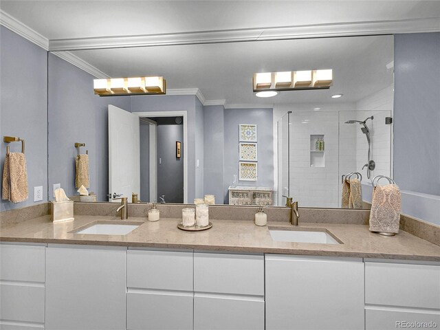 3481 S Race St, Englewood, CO 80113 - full bathroom featuring double vanity, a shower stall, and ornamental molding