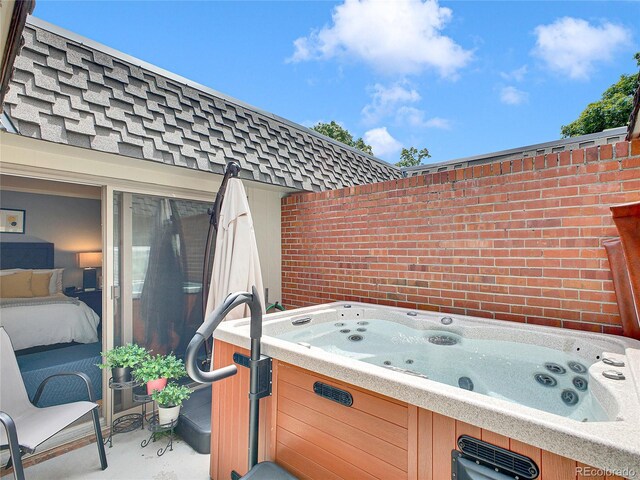 3481 S Race St, Englewood, CO 80113 - view of patio / terrace featuring a hot tub