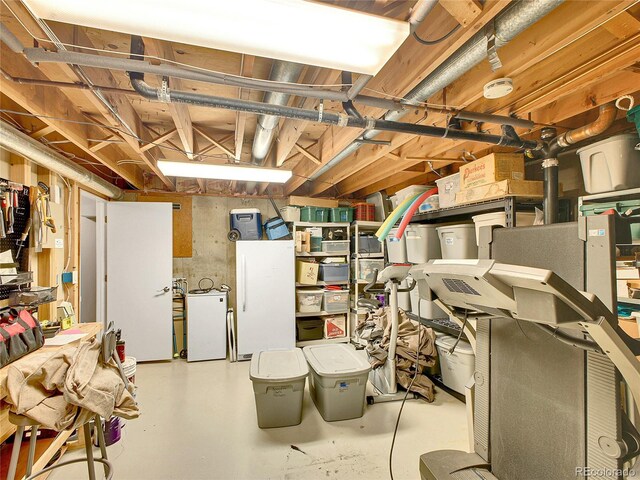 3481 S Race St, Englewood, CO 80113 - unfinished below grade area with refrigerator
