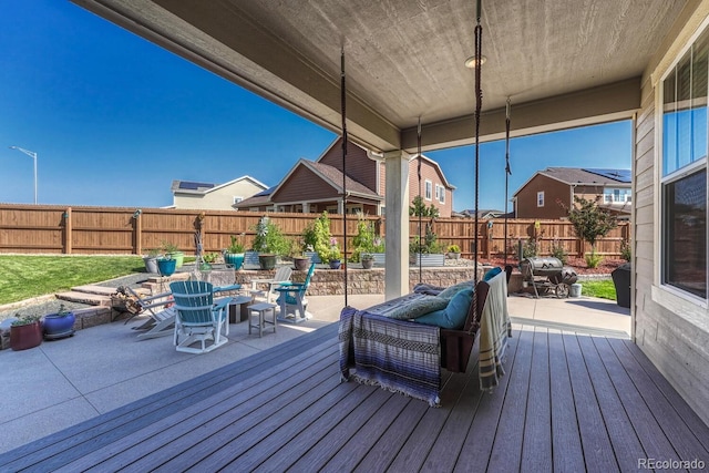 wooden deck featuring a patio