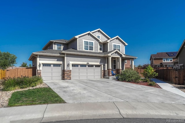 craftsman-style house featuring a garage