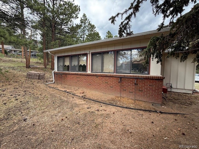 1013 Lexington Ln, Estes Park, CO 80517 - back of property featuring board and batten siding and brick siding