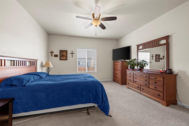 1868 Homestead Dr, Fort Lupton, CO 80621 - bedroom featuring multiple windows, light colored carpet, a ceiling fan, and baseboards
