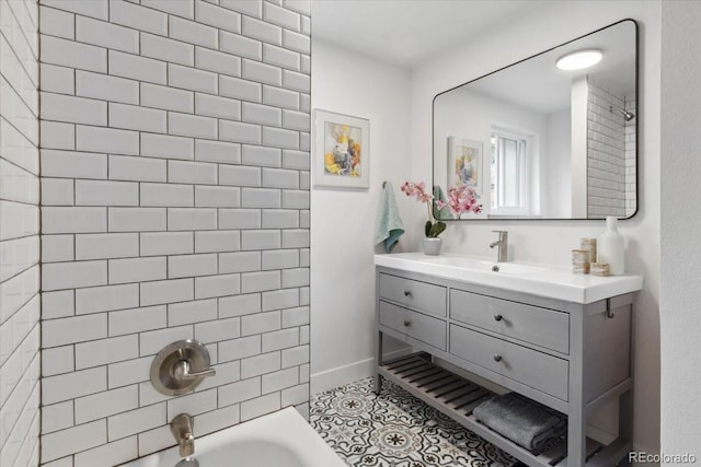 bathroom featuring shower / bath combination, vanity, and tile patterned flooring