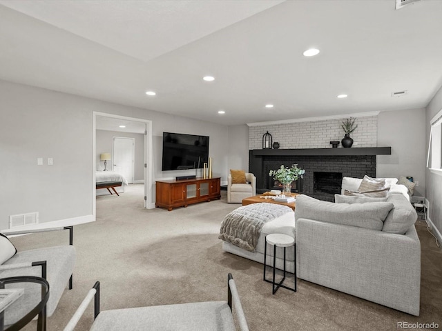 7055 E Heritage Pl S, Centennial, CO 80111 - living area featuring a brick fireplace, recessed lighting, baseboards, and light colored carpet