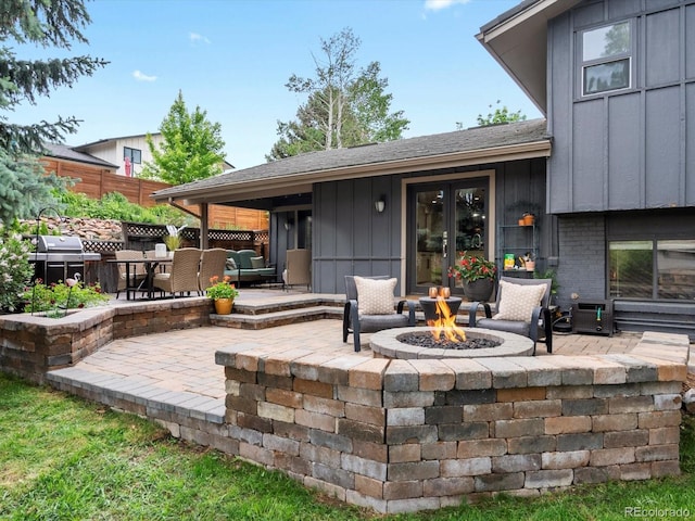 7055 E Heritage Pl S, Centennial, CO 80111 - view of patio / terrace with a fire pit, a grill, and french doors