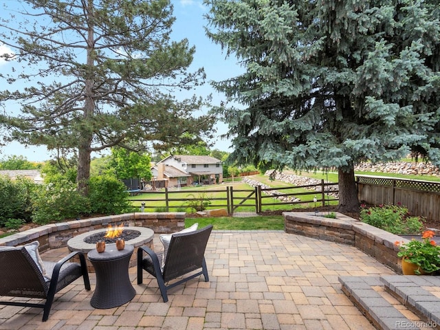 7055 E Heritage Pl S, Centennial, CO 80111 - view of patio featuring an outdoor fire pit
