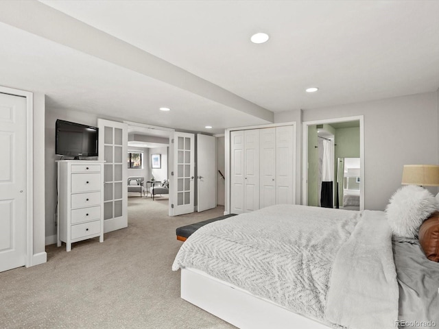 7055 E Heritage Pl S, Centennial, CO 80111 - bedroom with french doors, light colored carpet, recessed lighting, ensuite bath, and baseboards