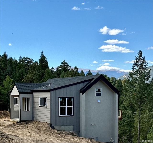 exterior space featuring a mountain view