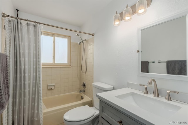 bathroom featuring toilet, vanity, and shower / bath combination with curtain