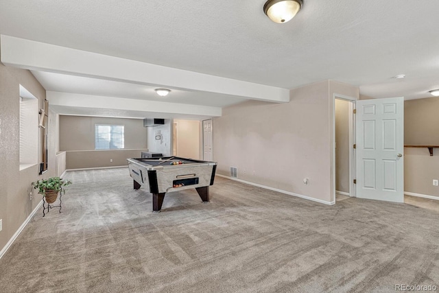 game room featuring beam ceiling, light carpet, and billiards