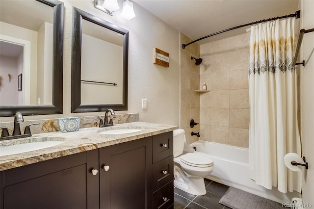 full bathroom with shower / bath combo, a sink, toilet, and tile patterned floors