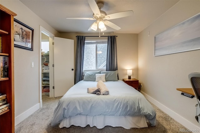 bedroom with carpet, baseboards, and ceiling fan