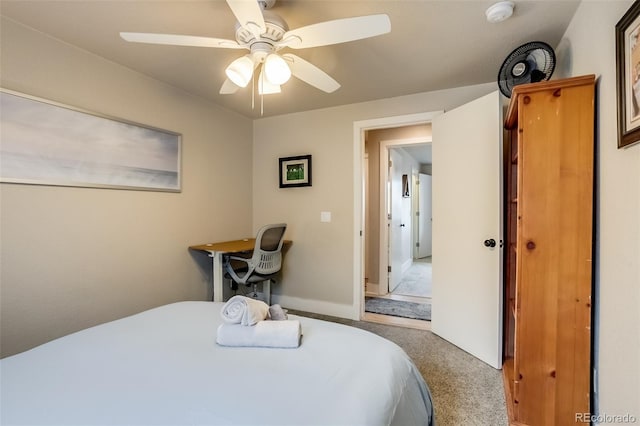 bedroom with ceiling fan and carpet