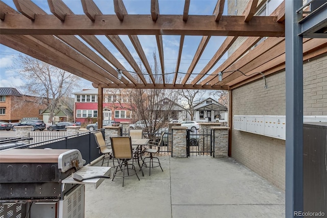 view of patio / terrace with outdoor dining area, grilling area, a residential view, and a pergola