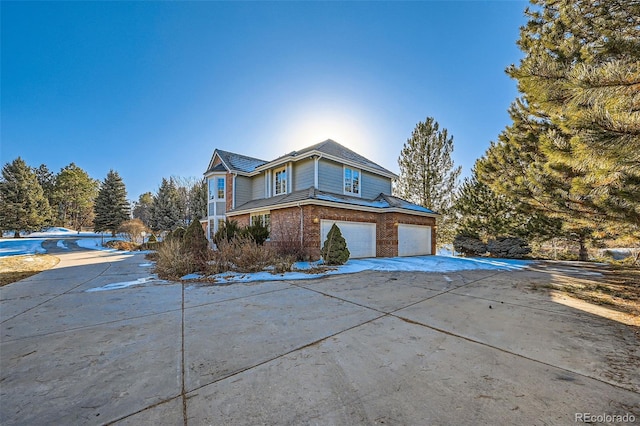 view of front of property featuring a garage