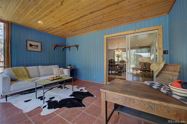 28051 Camel Heights Cir, Evergreen, CO 80439 - living area featuring tile patterned flooring, vaulted ceiling, wooden walls, and wood ceiling