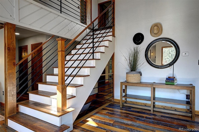 28051 Camel Heights Cir, Evergreen, CO 80439 - staircase featuring wood finished floors