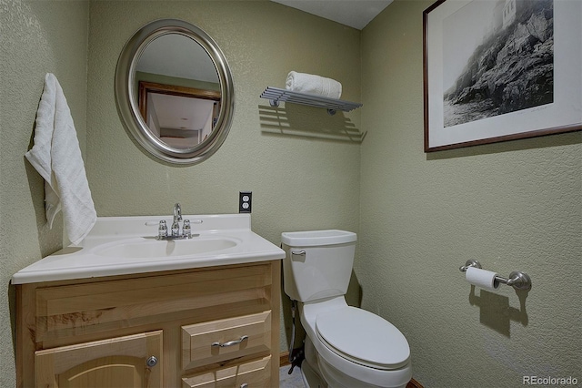 28051 Camel Heights Cir, Evergreen, CO 80439 - half bath featuring vanity and a textured wall