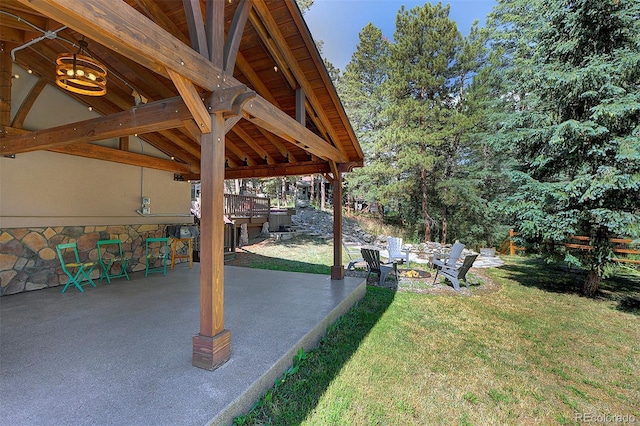 28051 Camel Heights Cir, Evergreen, CO 80439 - view of green lawn featuring a patio