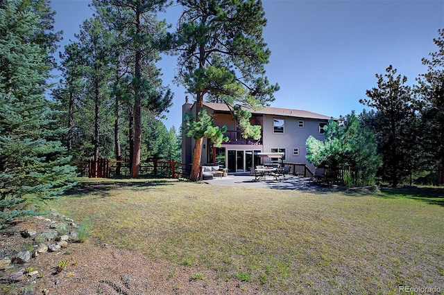 28051 Camel Heights Cir, Evergreen, CO 80439 - view of yard featuring a patio area and a balcony
