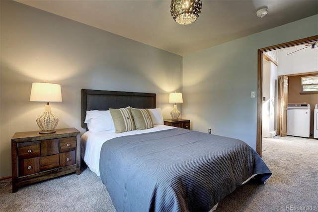 28051 Camel Heights Cir, Evergreen, CO 80439 - carpeted bedroom featuring washer and clothes dryer
