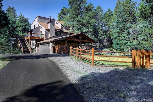 28051 Camel Heights Cir, Evergreen, CO 80439 - view of front of property with asphalt driveway