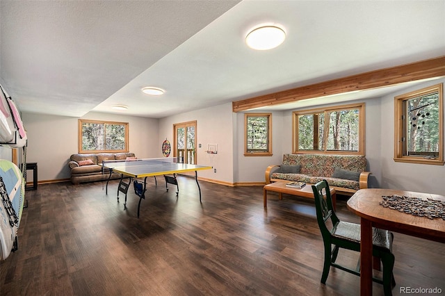 game room with wood finished floors and baseboards