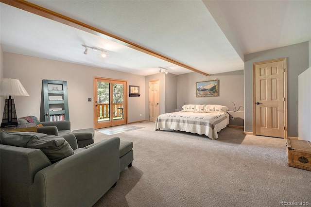 bedroom featuring access to outside, light colored carpet, and baseboards