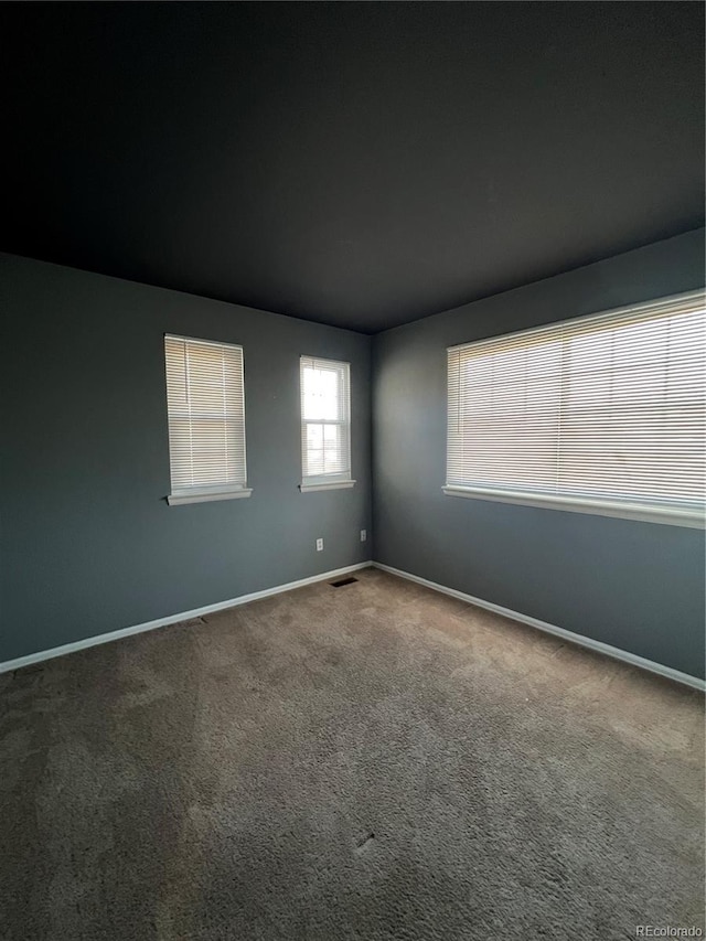 view of carpeted spare room