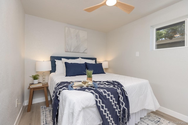 bedroom featuring ceiling fan and light wood-type flooring