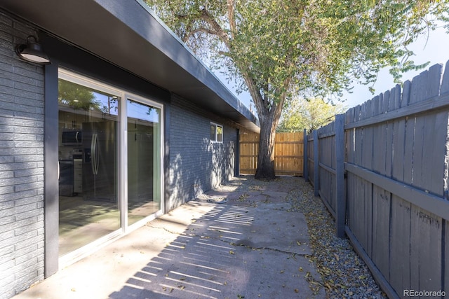 view of property exterior featuring a patio