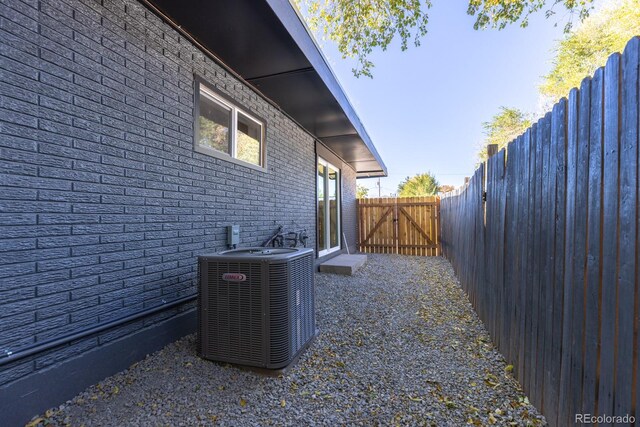 view of home's exterior with central AC unit