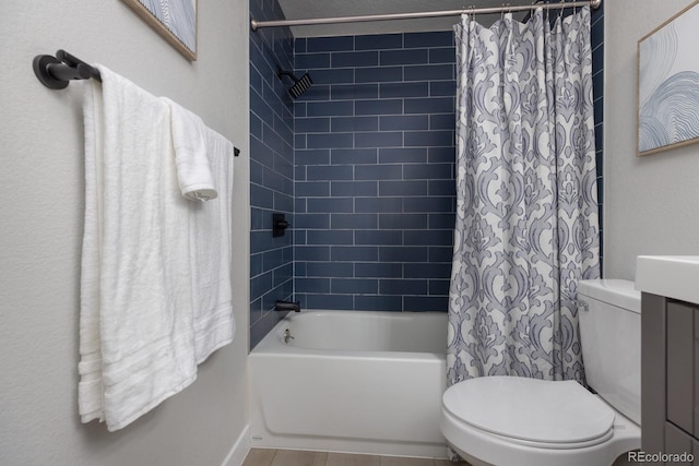 full bathroom featuring vanity, toilet, and shower / bath combo with shower curtain