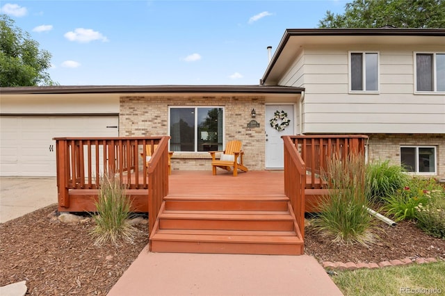 12705 W Chenango Ave, Morrison, CO 80465 - deck with an attached garage and concrete driveway