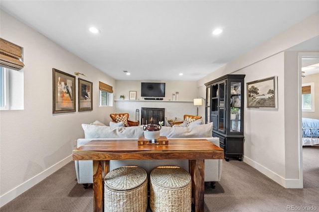 12705 W Chenango Ave, Morrison, CO 80465 - living room featuring carpet, plenty of natural light, recessed lighting, and a brick fireplace