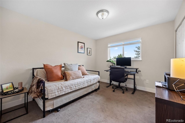 12705 W Chenango Ave, Morrison, CO 80465 - carpeted bedroom with a desk and baseboards