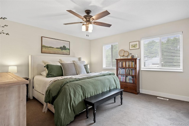 12705 W Chenango Ave, Morrison, CO 80465 - carpeted bedroom with baseboards and a ceiling fan