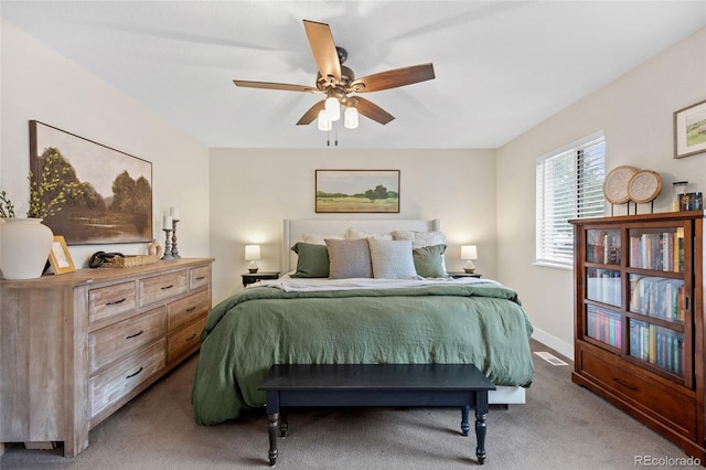 12705 W Chenango Ave, Morrison, CO 80465 - carpeted bedroom featuring ceiling fan and baseboards
