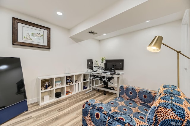 office area with wood finished floors, recessed lighting, and baseboards