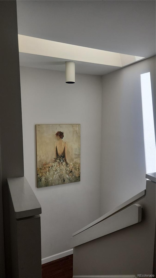 1600 S Quebec Way Unit 8, Denver, CO 80231 - staircase with wood finished floors, baseboards, and plenty of natural light
