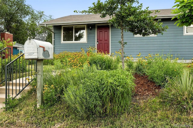 2011 S Vallejo St, Denver, CO 80223 - view of front of home with a shingled roof